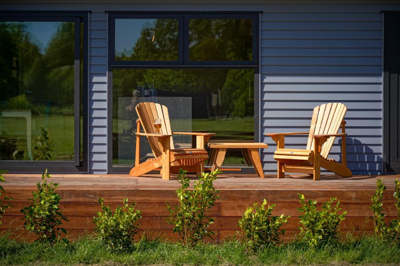Parehua Resort Martinborough Extérieur photo A deck with A-frame chairs