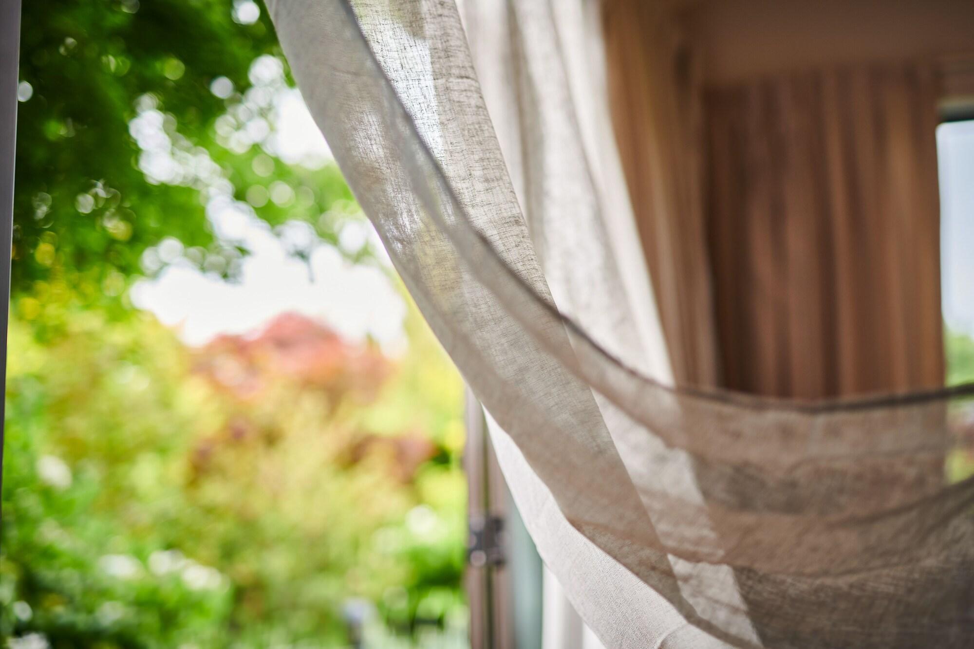 Parehua Resort Martinborough Extérieur photo A curtain